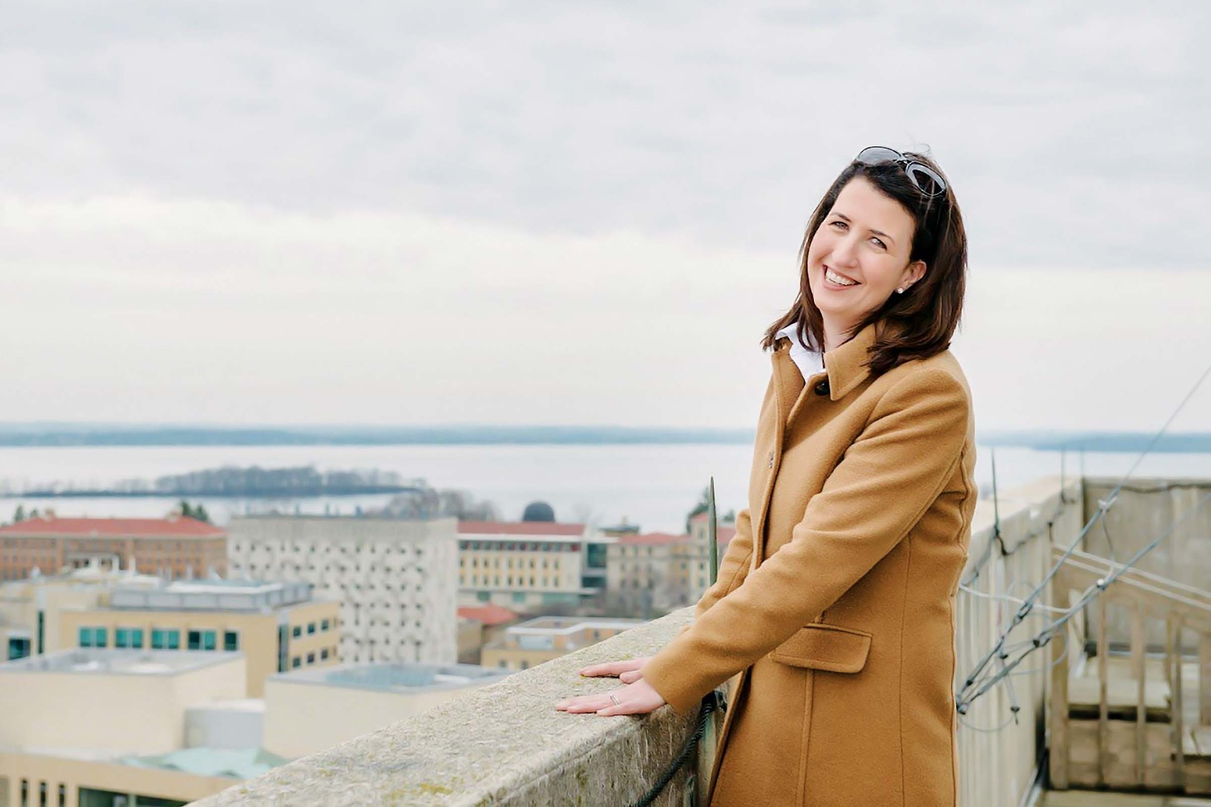Tracey Holloway standing outside with the Madison skyline behind her