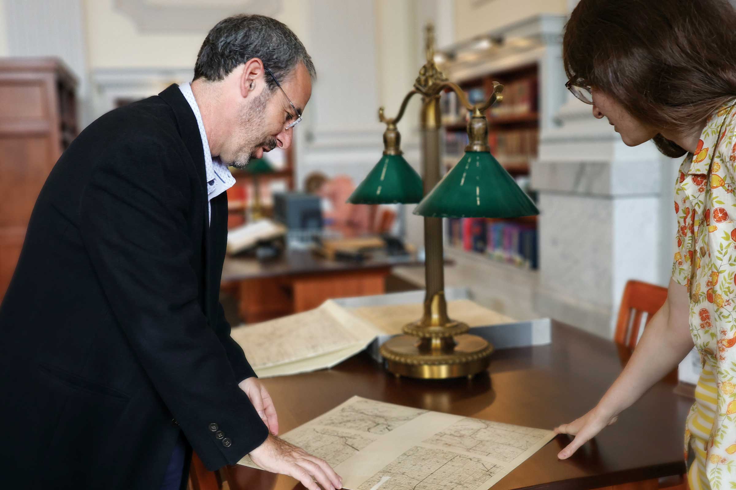 Stephen Kantrowitz looks at records with a student in the Wisconsin Historical Society