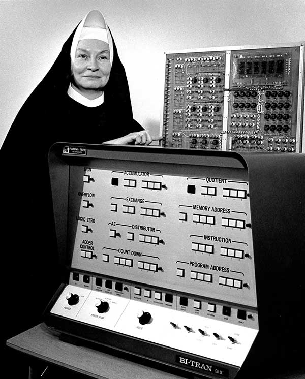 Photo of Sister Mary Kenneth Keller in front of a computer