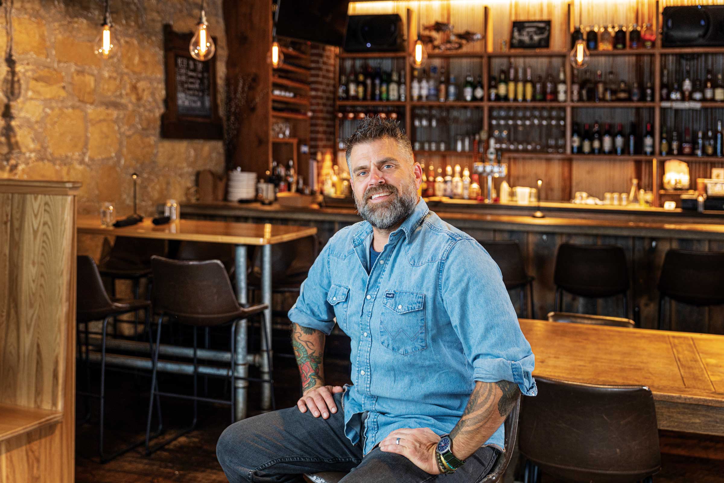 Portrait of Luke Zahm in his restaurant