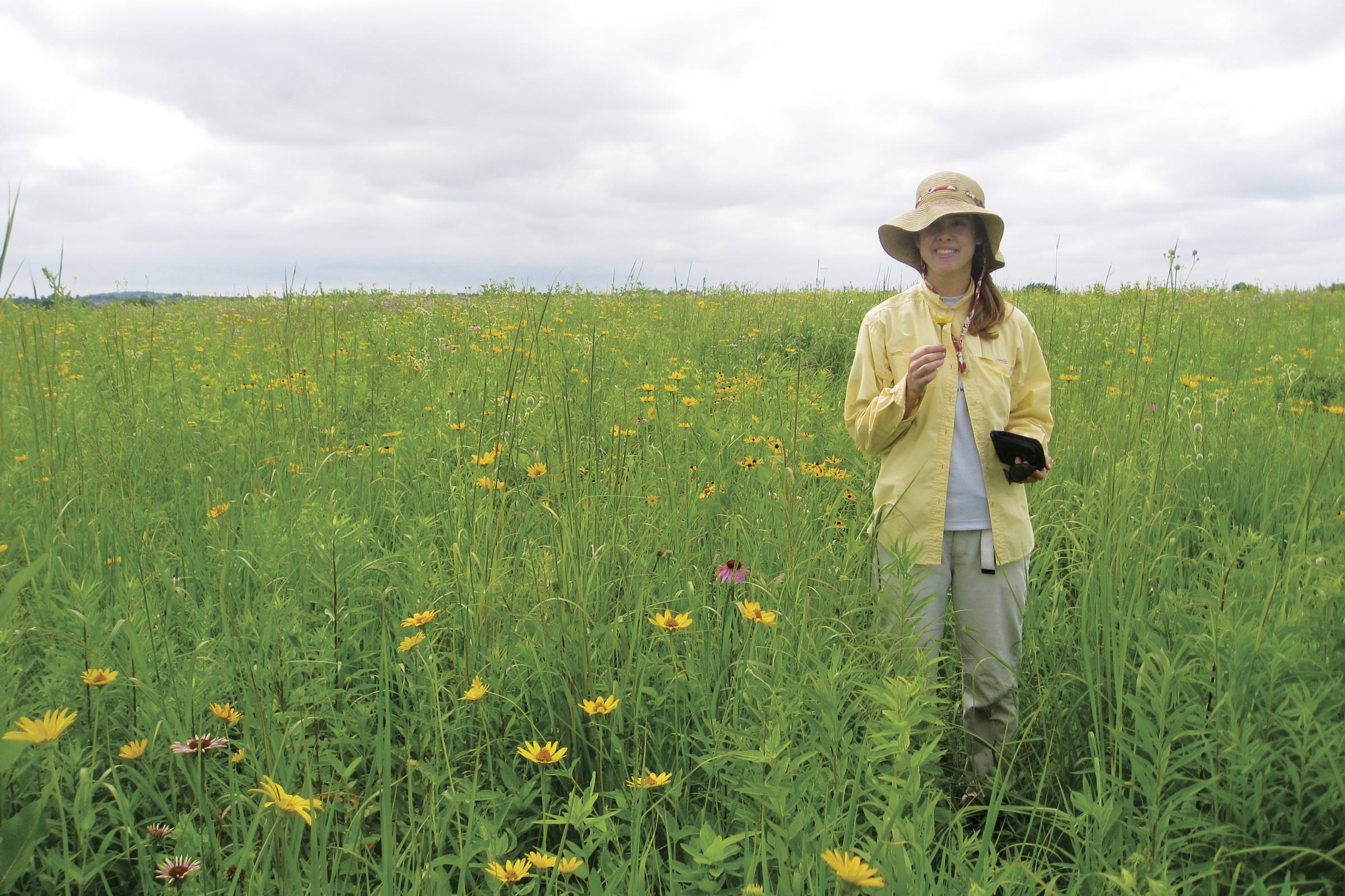 Photo of Evelyn Williams in a wildflower field